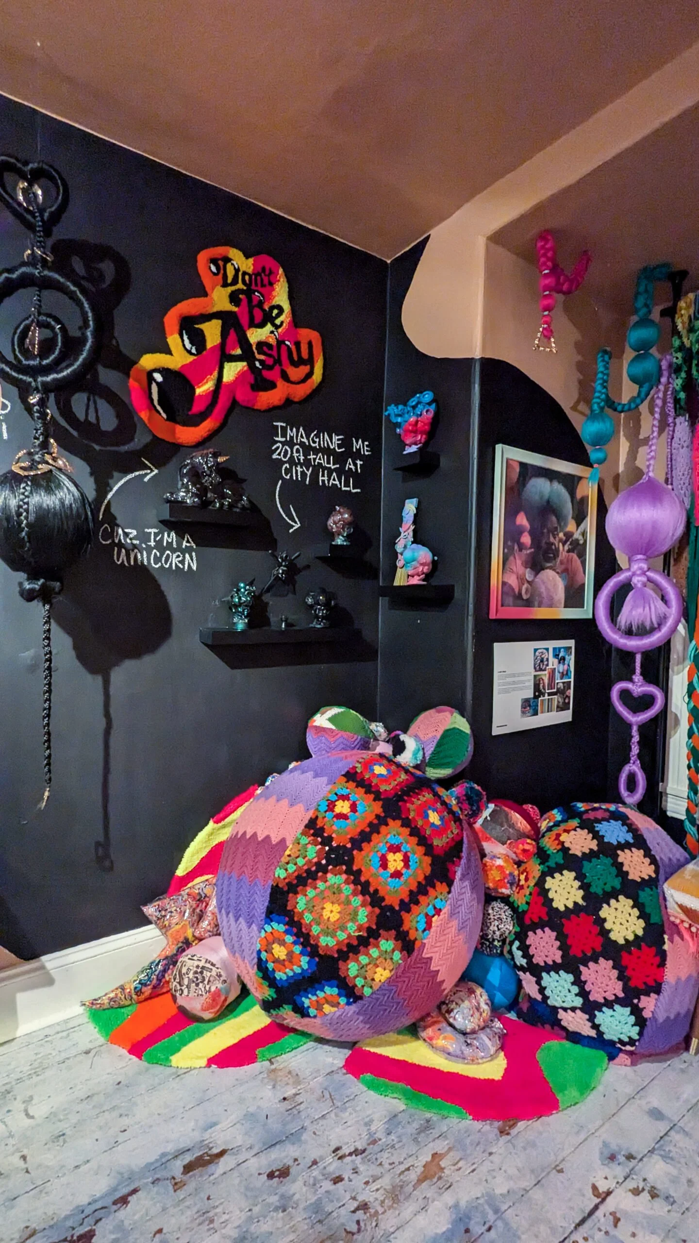 Soft sculpture and textile works in the museum gallery